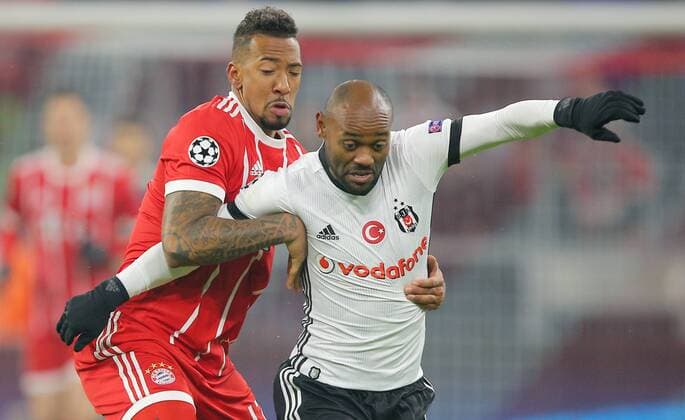 SOCCER - UEFA CL, Bayern vs Besiktas MUNICH,GERMANY,20.FEB.18 - SOCCER - UEFA Champions League, round of 16, FC Bayern Muenchen vs Besiktas Istanbul. Image shows Jerome Boateng (Bayern) and Vagner Love (Besiktas). GEPAxpictures xThomasxBachun
