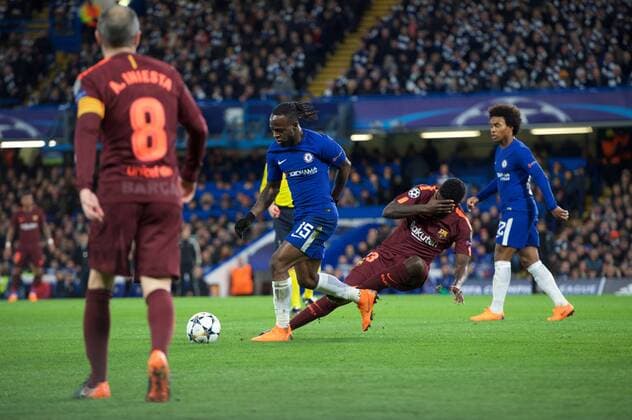 Chelsea v FC Barcelona Barca UEFA Champions League Samuel Umtiti of Barcelona goes down after a challenge from Victor Moses of Chelsea during the UEFA Champions League match at Stamford Bridge, London Content Not Available For UK Newspapers Copyright: xAlanxStanfordx FIL-11389-0019
