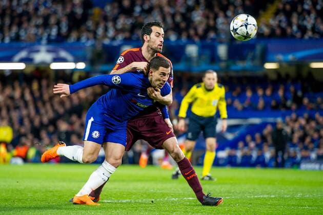 Eden Hazard of Chelsea and Sergio Busquets of Barcelona during the UEFA Champions League Round of 16 match between Chelsea and Barcelona at Stamford Bridge, London, England on 20 February 2018. Copyright: xSalvioxCalabresex 19030004