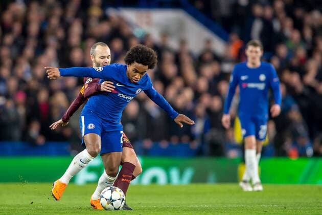 Andres Iniesta of Barcelona and Willian of Chelsea during the UEFA Champions League Round of 16 match between Chelsea and Barcelona at Stamford Bridge, London, England on 20 February 2018. Copyright: xSalvioxCalabresex 19030010