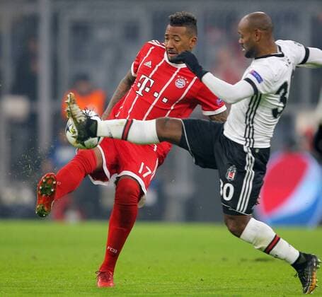 SOCCER - UEFA CL, Bayern vs Besiktas MUNICH,GERMANY,20.FEB.18 - SOCCER - UEFA Champions League, round of 16, FC Bayern Muenchen vs Besiktas Istanbul. Image shows Jerome Boateng (Bayern) and Vagner Love (Besiktas). GEPAxpictures xThomasxBachun