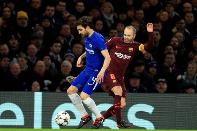 20th February 2018, Stamford Bridge, London, England; UEFA Champions League football, round of 16, 1st leg, Chelsea versus FC Barcelona Barca Cesc Fabregas of Chelsea under pressure from Andr& xe9;s Iniesta of Barcelona  ActionPlus11990618