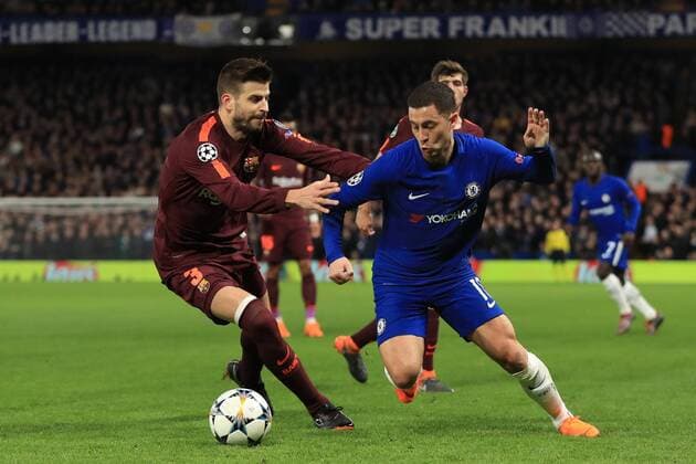20th February 2018, Stamford Bridge, London, England; UEFA Champions League football, round of 16, 1st leg, Chelsea versus FC Barcelona Barca Eden Hazard of Chelsea turns Gerard Piqu& xe9; of Barcelona  ActionPlus11990626
