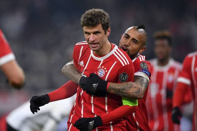 Football CHAMPIONS LEAGUE season 2017 2018 KNOCKOUT first leg FC Bayern München Besiktas Istanbul 20 02 2018 Thomas Mueller and Arturo Vidal re of both FC Bayern München cheer after the 3 0 Munich