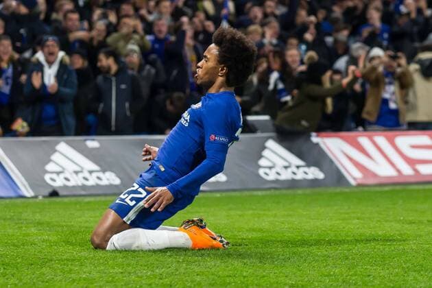 London England 20 02 2018 UEFA Champions League 2017 18 season round of 16 first leg Chelsea FC FC Barcelona goal celebration Willian FCC cheers after his hit 1 0 DeFodi507
