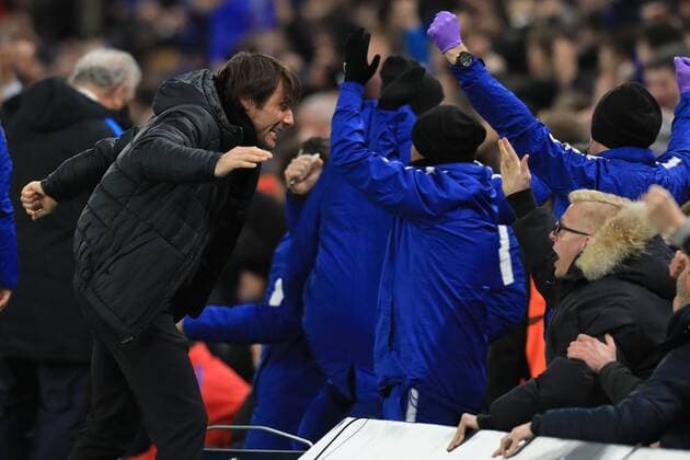 20th February 2018, Stamford Bridge, London, England; UEFA Champions League football, round of 16, 1st leg, Chelsea versus FC Barcelona Barca Chelsea Manager Antonio Conte celebrates Willian s goal with a fan  ActionPlus11990682