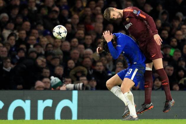 20th February 2018, Stamford Bridge, London, England; UEFA Champions League football, round of 16, 1st leg, Chelsea versus FC Barcelona Barca Gerard Piqu& xe9; of Barcelona battles to win a header against Marcos Alonso of Chelsea  ActionPlus11990683