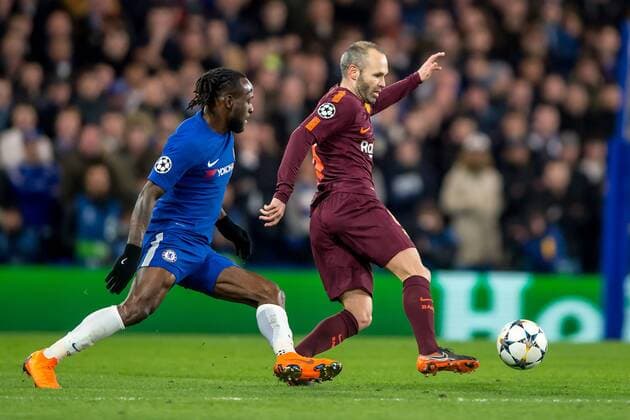 Andres Iniesta of Barcelona and Victor Moses of Chelsea during the UEFA Champions League Round of 16 match between Chelsea and Barcelona at Stamford Bridge, London, England on 20 February 2018. Copyright: xSalvioxCalabresex 19030100