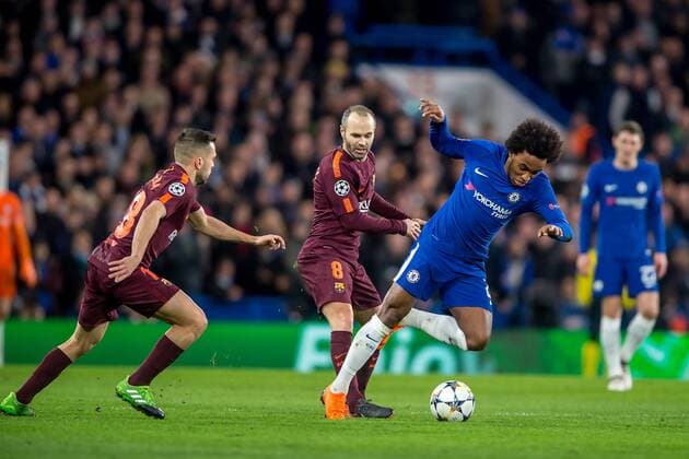 Willian of Chelsea is challenged by Andres Iniesta of Barcelona during the UEFA Champions League Round of 16 match between Chelsea and Barcelona at Stamford Bridge, London, England on 20 February 2018. Copyright: xSalvioxCalabresex 19030102