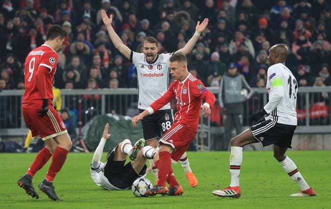 (180221) -- MUNICH, Feb. 21, 2018 -- Bayern Munich s Joshua Kimmich (Front C) competes during the first round match of eighth-finals of 2017-18 UEFA Champions League between Bayern Munich of Germany and Besiktas Istanbul of Turkey, in Munich, Germany, on Feb. 20, 2018. Bayern Munich won 5-0. ) (SP)GERMANY-MUNICH-SOCCER-UEFA CHAMPIONS LEAGUE-BAYERN MUNICH VS BESIKTAS PhilippexRuiz 
