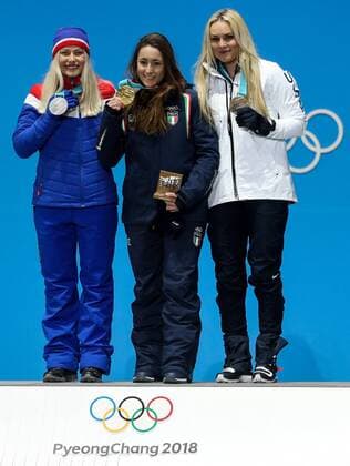 PyeongChang 2018 - Ski Alpin, Abfahrt Damen, Siegerehrung OLYMPICS - 2018 Winter Olympics PYEONGCHANG,SOUTH KOREA,21.FEB.18 - OLYMPICS,ALPINE SKIING - Olympic Winter games Winterspiele Spiele Summer games PyeongChang 2018, Medals Plaza, downhill, ladies, award ceremony. Image shows Ragnhild Mowinckel (NOR), Sofia Goggia (ITA) and Lindsey Vonn (USA). Keywords: medals. GEPAxpictures xMaticxKlansek