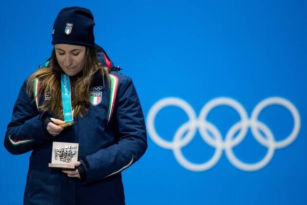 OLYMPICS - 2018 Winter Olympics PYEONGCHANG,SOUTH KOREA,21.FEB.18 - OLYMPICS,ALPINE SKIING - Olympic Winter games Winterspiele Spiele Summer games PyeongChang 2018, Medals Plaza, downhill, ladies, award ceremony. Image shows Sofia Goggia (ITA). Keywords: medal. GEPAxpictures xMaticxKlansek