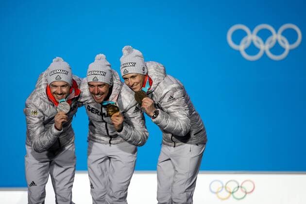 OLYMPICS - 2018 Winter Olympics PYEONGCHANG,SOUTH KOREA,21.FEB.18 - OLYMPICS,NORDIC SKIING, NORDIC COMBINED - Olympic Winter games Winterspiele Spiele Summer games PyeongChang 2018, Medals Plaza, individual large hill, men, award ceremony. Image shows Eric Frenzel (GER), Johannes Rydzek (GER) and Fabian Riessle (GER). Keywords: medals. GEPAxpictures xMaticxKlansek