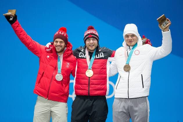 From left MenÕs Ski Cross silver medalist Marc Bischofberger of Switzerland, gold medalist Brady Leman of Canada, and Sergey Ridzik an Olympic Athlete from Russia pose for a photo during the medals ceremony at Pyeongchang Medals Plaza in Pyeongchang, South Korea on February 21, 2018.  OLY20180221146 MATTHEWxHEALEY