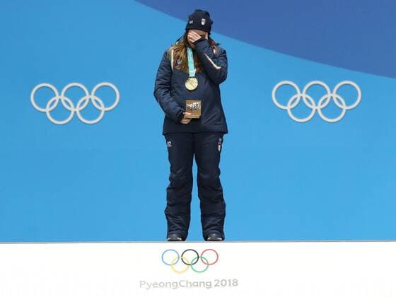 (180221) -- PYEONGCHANG, Feb. 21, 2018 -- Gold medalist Sofia Goggia of Italy reacts during medal ceremony of ladies downhill of alpine skiing at 2018 PyeongChang Winter Olympic Games Olympische Spiele Olympia OS at Medal Plaza, PyeongChang, South Korea, Feb. 21, 2018. ) (SP)OLY-SOUTH KOREA-PYEONGCHANG-ALPINE SKIING-LADIES DOWNHILL-MEDAL CEREMONY LixGang 
