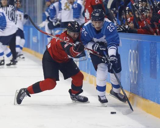 February 21, 2018 - Pyeongchang, KOREA - Finland forward Jonas Enlund (25) and Canada forward Brandon Kozun (15) at the men s quarterfinal hockey game between Finland and Canada at the Pyeongchang 2018 Olympic Winter games Winterspiele Spiele Summer games at Gangneung Hockey Centre. Canada beat Finland 1-0. Olympics Pyeongchang 2018: Ice hockey Eishockey Men Team Quarterfinal-CAN-FIN - ZUMAm117 20180221_zaf_m117_249 Copyright: xDavidxG.xMcintyrex