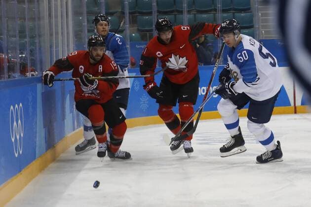 February 21, 2018 - Pyeongchang, KOREA - Canada forward Andrew Ebbett (19), Canada forward Linden Vey (91) and Finland defenseman Miika Koivisto (50) in the men s quarterfinal hockey game between Finland and Canada at the Pyeongchang 2018 Olympic Winter games Winterspiele Spiele Summer games at Gangneung Hockey Centre. Canada beat Finland 1-0. Olympics Pyeongchang 2018: Ice hockey Eishockey Men Team Quarterfinal-CAN-FIN - ZUMAm117 20180221_zaf_m117_260 Copyright: xDavidxG.xMcintyrex