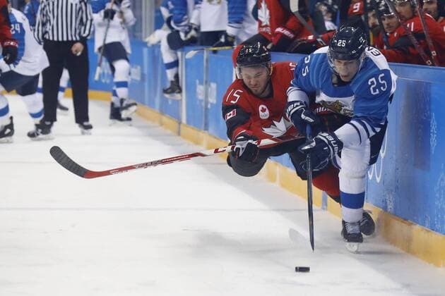 February 21, 2018 - Pyeongchang, KOREA - Finland forward Jonas Enlund (25) and Canada forward Brandon Kozun (15) at the men s quarterfinal hockey game between Finland and Canada at the Pyeongchang 2018 Olympic Winter games Winterspiele Spiele Summer games at Gangneung Hockey Centre. Canada beat Finland 1-0. Olympics Pyeongchang 2018: Ice hockey Eishockey Men Team Quarterfinal-CAN-FIN - ZUMAm117 20180221_zaf_m117_269 Copyright: xDavidxG.xMcintyrex