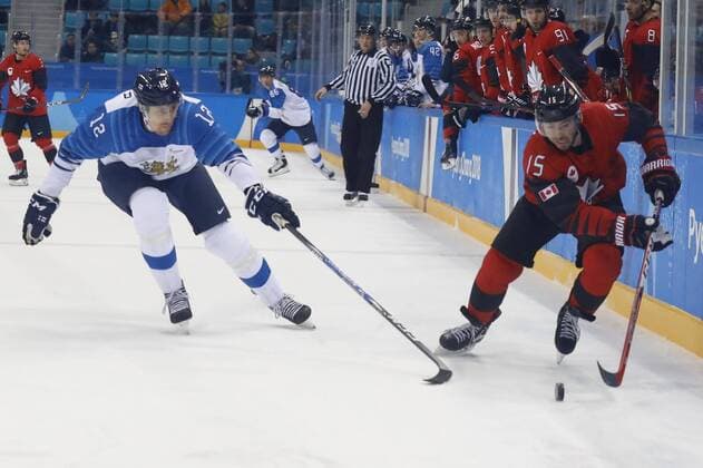 February 21, 2018 - Pyeongchang, KOREA - Canada forward Brandon Kozun (15) and Finland forward Marko Anttila (12) in the men s quarterfinal hockey game between Finland and Canada at the Pyeongchang 2018 Olympic Winter games Winterspiele Spiele Summer games at Gangneung Hockey Centre. Canada beat Finland 1-0. Olympics Pyeongchang 2018: Ice hockey Eishockey Men Team Quarterfinal-CAN-FIN - ZUMAm117 20180221_zaf_m117_274 Copyright: xDavidxG.xMcintyrex