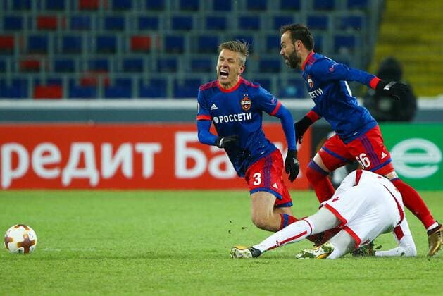 MOSCOW, RUSSIA - FEBRUARY 21, 2018: CSKA Moscow s Pontus Wernbloom and Bibras Natkho (L-R back) in their 2017-2018 UEFA Europa League Round of 32 second leg football match against Crvena Zvezda Belgrade at VEB Arena in Moscow; CSKA Moscow won 1-0. Mikhail Tereshchenko TASS  TS075244