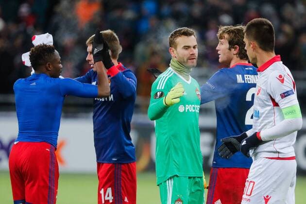 MOSCOW, RUSSIA - FEBRUARY 21, 2018: CSKA Moscow s Ahmed Musa, Kirill Nababkin, goalkeeper Igor Akinfeev, Mario Fernandes, and Crvena Zvezda Belgradeâ€™s Vujadin Savic (L-R) after their 2017-2018 UEFA Europa League Round of 32 second leg football match at VEB Arena in Moscow; CSKA Moscow won 1-0. Mikhail Metzel TASS  TS07525E