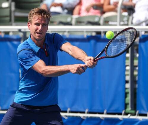 February 21, 2018: Peter Gojowczyk, from Germany, plays a backhand against John Isner, from USA, during the 2018 Delray Beach Open ATP Tennis Herren professional tennis tournament, played at the Delray Beach Stadium & Tennis Center in Delray Beach, Florida, USA. Peter Gojowczyk won 7-6 (3), 6-7 (4), 7-6 (5). CSM Tennis 2018: ATP Delray Beach Open FEB 21 - ZUMAc04_ 20180221_zaf_c04_208 Copyright: xMarioxHoubenx