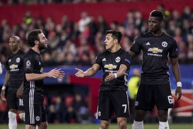 February 21, 2018 - Seville, Spain - ALEXIS SANCHEZ (C ), JUAN MATA (L ) and PAUL POGBA (R ) of Manchester laments after missing a chance at goal during the UEFA Champions League Round of 16 (first leg) match between Sevilla FC and Manchester United ManU at Estadio Ramon Sanchez Pizjuan Soccer 2018 - Sevilla FC vs Manchester United - ZUMAa142 20180221_zap_a142_014 Copyright: xDanielxGonzalezxAcunax