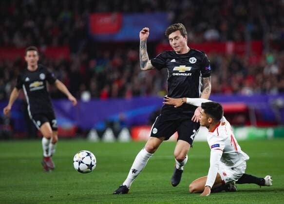 21st February 2018, Ramon Sanchez Pizjuan, Seville, Spain; UEFA Champions League football, round of 16, 1st leg, Sevilla versus Manchester United ManU Lindelof from Manchester United brings the ball forward  ActionPlus11991131