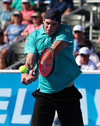 February 21, 2018: John Isner, from USA, hits a backhand against Peter Gojowczyk, from Germany, during the 2018 Delray Beach Open ATP Tennis Herren professional tennis tournament, played at the Delray Beach Stadium & Tennis Center in Delray Beach, Florida, USA. Peter Gojowczyk won 7-6 (3), 6-7 (4), 7-6 (5). CSM Tennis 2018: ATP Delray Beach Open FEB 21 - ZUMAc04_ 20180221_zaf_c04_229 Copyright: xMarioxHoubenx