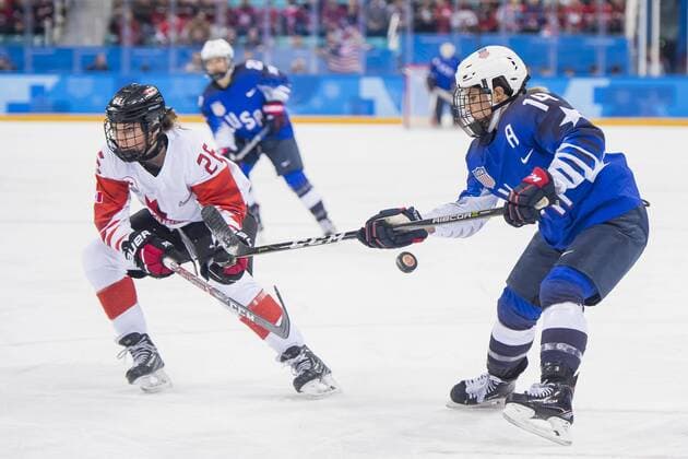 180222 Brianna Decker or USA and Emily Clark of Canada during the Womens Ice Hockey Final between USA and Canada during day thirteen of the 2018 Winter Olympics on February 22, 2018 in Pyeongchang Photo Petter Arvidson BILDBYRAN Code PA 91993  Copyright: PETTERxARVIDSON BB180222PA008
