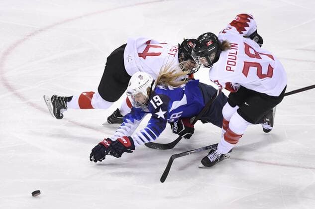 PyeongChang 2018, Eishockey, USA - Kanada, Finale Damen February 22, 2018 - Pyeongchang, South Korea - USA s GIGI MARVIN is taken down by Canada Ã‚â‚¬Ã‚â ¢s RENATA FAST and MARIE-PHILIP POULIN in the first period of the Women s Gold Medal Ice hockey Eishockey game Thursday, February 22, 2018 at Gangneung Hockey Centre at the Pyeongchang Winter Olympic Games Olympische Spiele Olympia OS , ZUMA Press The Gazette PyeongChang 18: Ice Hockey Women - ZUMAr157 20180222_zap_r157_002 Copyright: xMarkxReisx