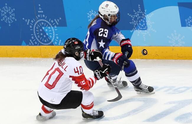 GANGNEUNG, SOUTH KOREA - FEBRUARY 22, 2018: Canadaâ€™s Blayre Turnbull (front) and the United Statesâ€™ Sidney Morin in the women s final Ice hockey Eishockey match as part of the 2018 Winter Olympic Games Olympische Spiele Olympia OS at the Gangneung Hockey Centre. Valery Sharifulin TASS  TS0752B3