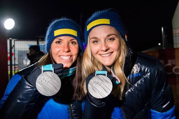 180222 Charlotte Kalla and Stina Nilsson of Sweden Silver celebrates with the medals at the Medal Ceremony during day thirteen of the 2018 Winter Olympics on February 22, 2018 in Pyeongchang Photo Carl Sandin BILDBYRAN Code CS 57999 316  Copyright: CARLxSANDIN BB180222CS034