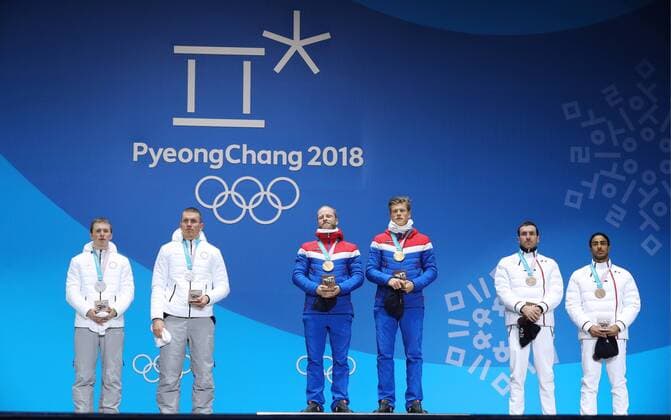 PYEONGCHANG, SOUTH KOREA - FEBRUARY 22, 2018: Silver medalists, Olympic Athletes from Russia Denis Spitsov and Alexander Bolshunov, Gold medalists, Norway s Martin Johnsrud Sundby and Johannes Hoesflot Klaebo and Bronze medalists, France s Maurice Manificat and Richard Jouve (L-R) during a victory ceremony for the men s cross-country skiing team sprint free event at the 2018 Winter Olympic Games Olympische Spiele Olympia OS at Medal Plaza. Sergei Bobylev TASS  TS075383