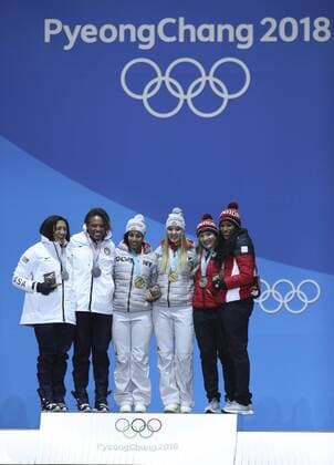 PyeongChang 2018, Bob, Zweierbob Damen, Siegerehrung (180222) -- PYEONGCHANG, Feb. 22, 2018 -- Champion Germany s Mariama Jamanka (3rd L) and Lisa Buckwitz (3rd R), second-placed Elana Meyers Taylor (1st L) and Lauren Gibbs (2nd L) of the United States and third-placed Kaillie Humphries (2nd R) and Phylicia George of Canada pose for photos during medal ceremony of bobsleigh women event at the 2018 PyeongChang Winter Olympic Games Olympische Spiele Olympia OS at Medal Plaza, PyeongChang, South Korea, Feb. 22, 2018. ) (SP)OLY-SOUTH KOREA-PYEONGCHANG-BOBSLEIGH-WOMEN-MEDAL CEREMONY BaixXuefei