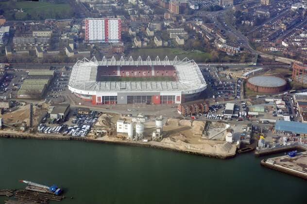 UK Weather Sunny in Southampton Southampton UK 22nd February 2018 Cloud with occassional sunshine in the South Coast port city. A break in the cloud casts the sun rays on to St Mary s Stadium, home to Southampton (Saints) Football Club with a training just visible on the pitch. Aerial image seen from an aircraft landin at the local airport. 