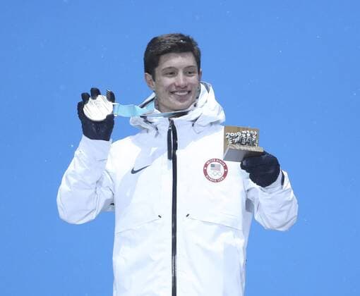 (180222) -- PYEONGCHANG, Feb. 22, 2018 -- Silver medalist Alex Ferreira of the United States poses for photos at medal ceremony of men s ski halfpipe of freestyle skiing at the 2018 PyeongChang Winter Olympic Games Olympische Spiele Olympia OS at Medal Plaza, PyeongChang, South Korea, Feb. 22, 2018. ) (SP)OLY-SOUTH KOREA-PYEONGCHANG-FREESTYLE SKIING-MEN S SKI HALFPIPE-MEDAL CEREMONY BaixXuefei 
