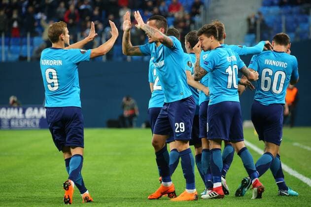 ST PETERSBURG, RUSSIA â€“ FEBRUARY 22, 2018: Zenit St Petersburg s Alexander Kokorin and Anton Zabolotny (L-R) celebrate scoring in their Leg 2 of the 2017 18 UEFA Europa League Round of 32 football match at Saint Petersburg Stadium. Peter Kovalev TASS  TS07552D