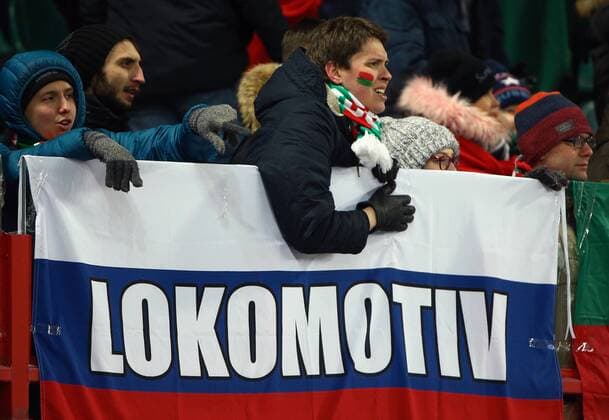 MOSCOW, RUSSIA - FEBRUARY 22, 2018: Fans of Lokomotiv Moscow cheer during the 2017 18 UEFA Europa League Round of 32 second leg football match against OGC Nice at RZD Arena Stadium. Lokomotiv Moscow won the game 1-0. Mikhail Tereshchenko TASS  TS07555C