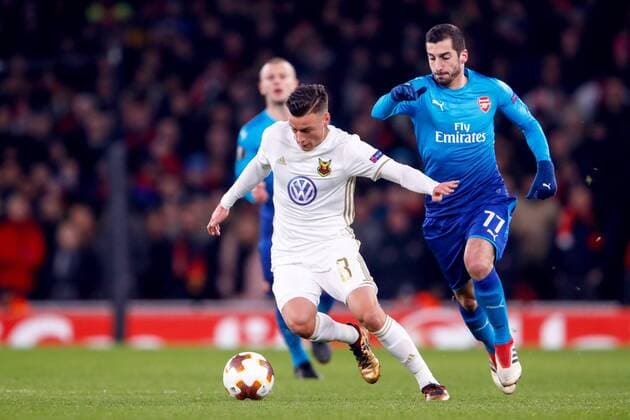 180222 Östersund Jamie Hopcutt and Arsenal Henrikh Mkhitaryan during the football match in the Europa League between Arsenal and Östersund on February 22, 2018 in London  Copyright: ANDREASxLxERIKSSON BB180222AE021