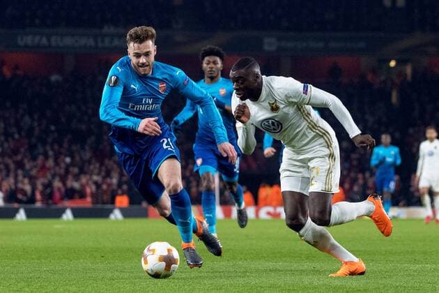 180222 Arsenal Calum Chambers and Östersund Ken Sema during the football match in the Europa League between Arsenal and Östersund on February 22, 2018 in London  Copyright: ANDREASxLxERIKSSON BB180222AE028