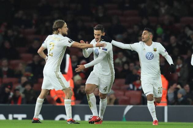 22nd February 2018, Emirates Stadium, London, England; UEFA Europa League football, round of 32, 2nd leg, Arenal versus Ostersund FK; Hosam Aiesh of Ostersunds celebrates with Tom Pettersson as Calum Chambers of Arsenal scores a own goal in the 22nd minute for 0-1  ActionPlus11991382