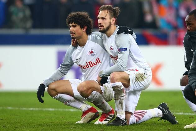SOCCER - EL, RBS vs Sociedad SALZBURG, AUSTRIA, 22.FEB.18 - SOCCER - UEFA Europa League, Red Bull Salzburg vs Real Sociedad. Image shows Andreas Ulmer and Andre Ramalho (RBS). GEPAxpictures xFelixxRoittner