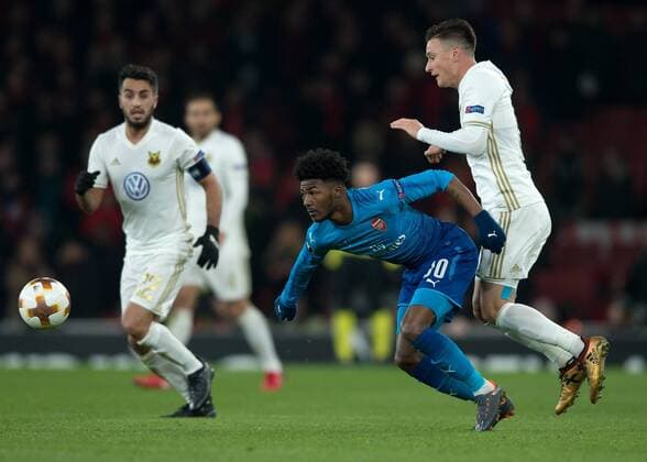 Ainsley Maitland-Niles of Arsenal battles with Jamie Hopcutt of Östersunds FK during the UEFA Europa League Round of 16 Second Leg match between Arsenal and Östersunds FK at the Emirates Stadium, London, England on 22 February 2018. Copyright: xVincexMignottx 19020017