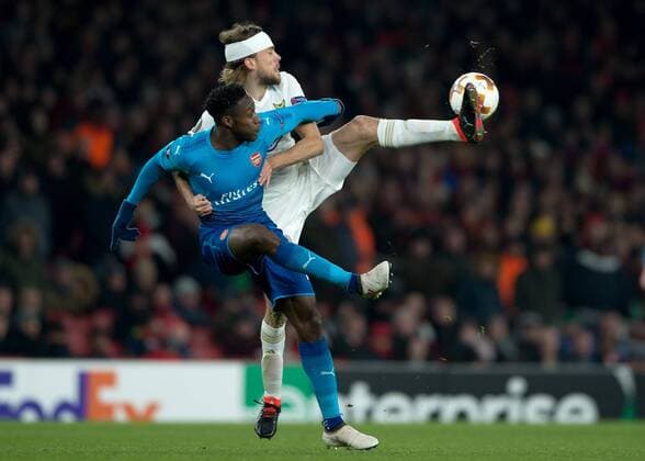 Tom Pettersson of Östersunds FK battles with Danny Welbeck of Arsenal during the UEFA Europa League Round of 16 Second Leg match between Arsenal and Östersunds FK at the Emirates Stadium, London, England on 22 February 2018. Copyright: xVincexMignottx 19020019