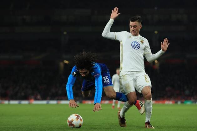 22nd February 2018, Emirates Stadium, London, England; UEFA Europa League football, round of 32, 2nd leg, Arenal versus Ostersund FK; Jamie Hopcutt of Ostersunds fouls Mohamed Elneny of Arsenal  ActionPlus11991416
