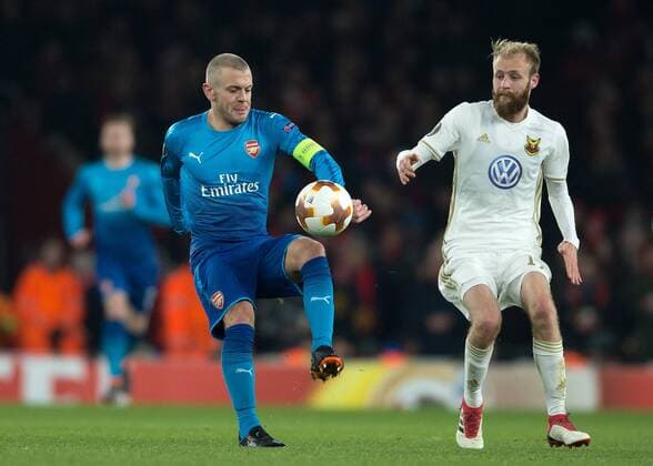 Jack Wilshere of Arsenal and Curtis Edwards of Östersunds FK in action during the UEFA Europa League Round of 16 Second Leg match between Arsenal and Östersunds FK at the Emirates Stadium, London, England on 22 February 2018. Copyright: xVincexMignottx 19020020