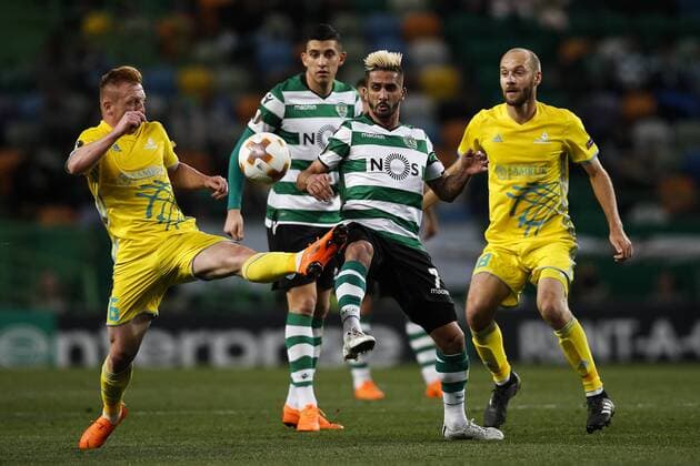 February 22, 2018 - Lisbon, Portugal - Sporting s midfielder Ruben Ribeiro (C) vies for the ball with Astana s midfielder Laszlo Tleinheisler (L) and Astana s midfielder Ivan Maevski (R) during UEFA Europa League round of 32 second leg football match between Sporting CP vs FC Astana, in Lisbon, on February 21, 2018. Sporting Lisbon v FC Astana - UEFA Europa League  - ZUMAn230 20180222_zaa_n230_503 Copyright: xCarlosxPalmax