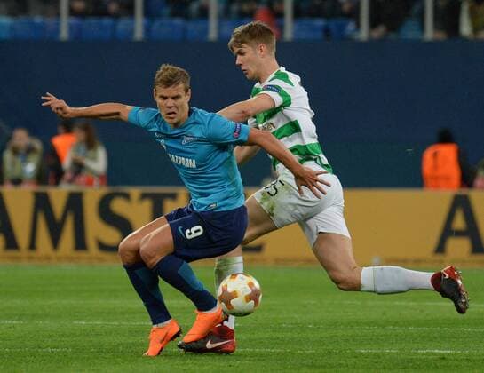 Russia. St. Petersburg. February 22, 2018. Players of Zenit Alexander Kokorin and Celtic Kristoffer Ayer (from left to right) in a match 1 16 finals of the UEFA Europa League, between the Zenit team (St. Petersburg, Russia) and the Celtic team (Glasgow, Scotland).