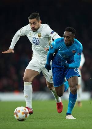 Danny Welbeck of Arsenal and Sotiris Papagiannopoulos of Östersunds FK in action during the UEFA Europa League Round of 16 Second Leg match between Arsenal and Östersunds FK at the Emirates Stadium, London, England on 22 February 2018. Copyright: xVincexMignottx 19020031